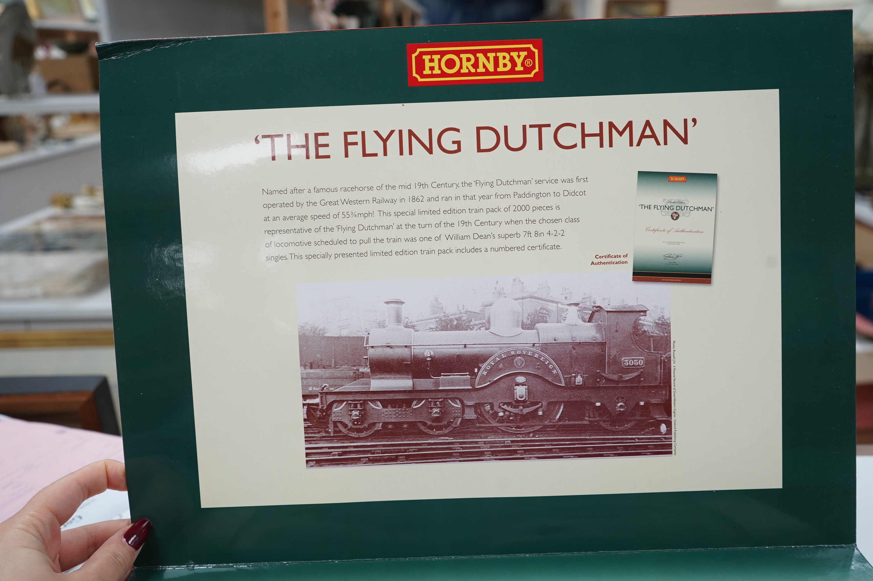 a Hornby hobbies 00 gauge railway the flying Dutchman train pack, R2706, comprising of a GWR 4-2-2 locomotive, Royal Sovereign, and three clerestory coaches. Condition - good.